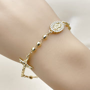 Oro Laminado Fancy Bracelet, Gold Filled Style Guadalupe and Crucifix Design, with White Cubic Zirconia, Diamond Cutting Finish, Golden Finish