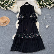 Vintage elegant dress with patchwork embroidery, lace ruffles, high-quality flared sleeves
