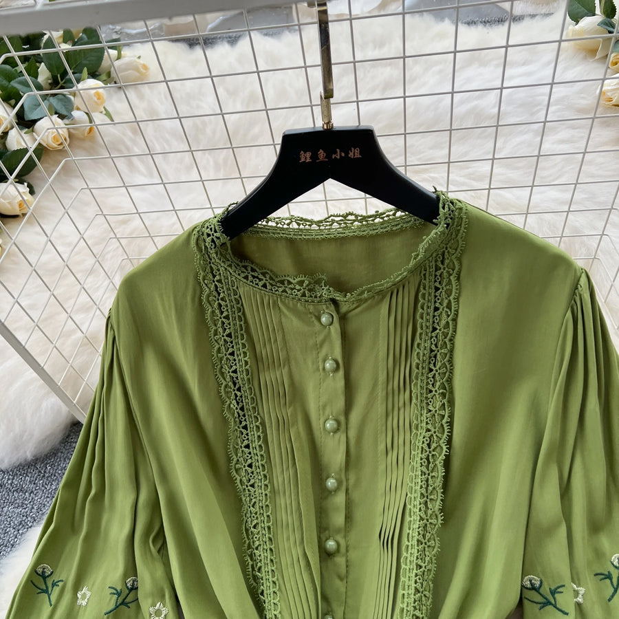 Vintage elegant dress with patchwork embroidery, lace ruffles, high-quality flared sleeves