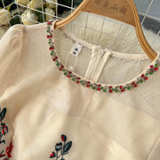 Elegant dress with flower embroidery O-neck and long puff sleeves and high quality belt