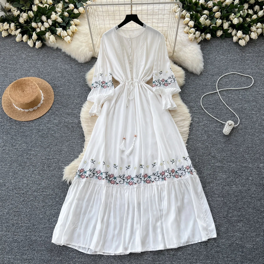 Vintage elegant dress with patchwork embroidery, lace ruffles, high-quality flared sleeves