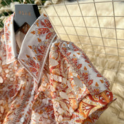 Elegant vintage button-down midi dress with high-quality print