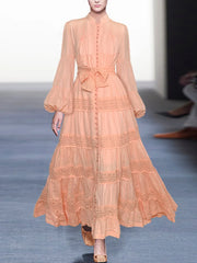 Elegant dresses with stitching and stand collar, bell sleeve with single row of high quality buttons.