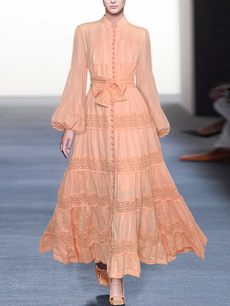 Elegant dresses with stitching and stand collar, bell sleeve with single row of high quality buttons.