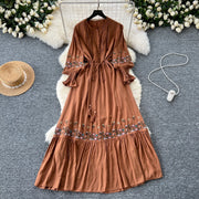 Vintage elegant dress with patchwork embroidery, lace ruffles, high-quality flared sleeves