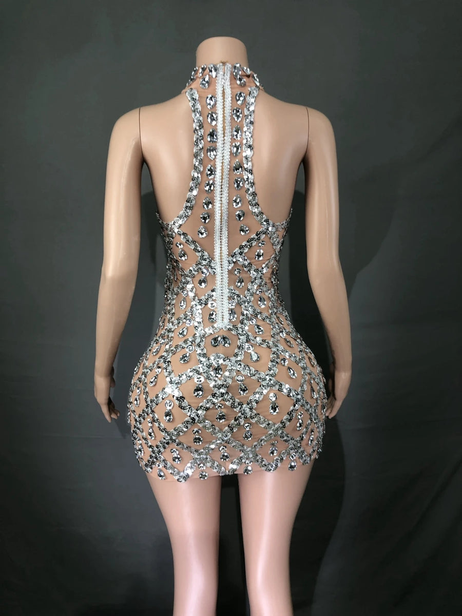 Sheer tight fit short dress with shiny pink sequins and diamonds