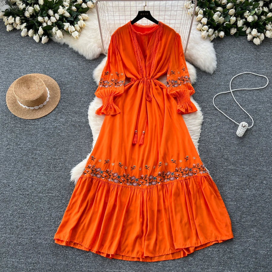 Vintage elegant dress with patchwork embroidery, lace ruffles, high-quality flared sleeves