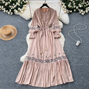 Vintage elegant dress with patchwork embroidery, lace ruffles, high-quality flared sleeves