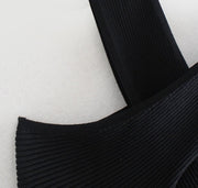 Casual black blouse with crossed straps
