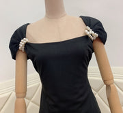 Elegant black midi dress with high quality shoulder detail