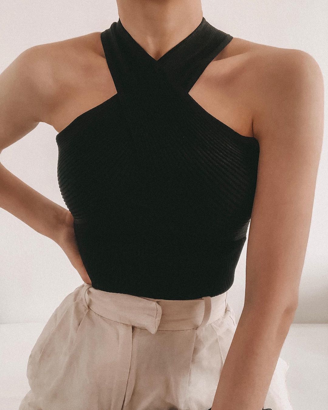 Casual black blouse with crossed straps