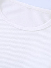 Black and white knit t-shirt with long sleeves tassel design