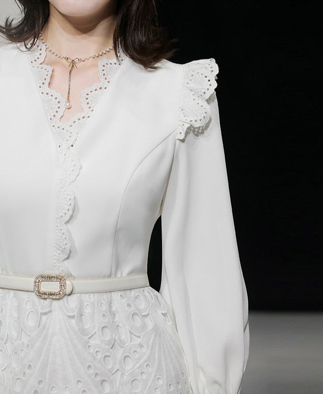 Elegant white midi dress with embroidery long sleeves of high quality