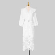Elegant white midi dress with embroidery long sleeves of high quality