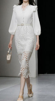 Elegant white midi dress with embroidery long sleeves of high quality